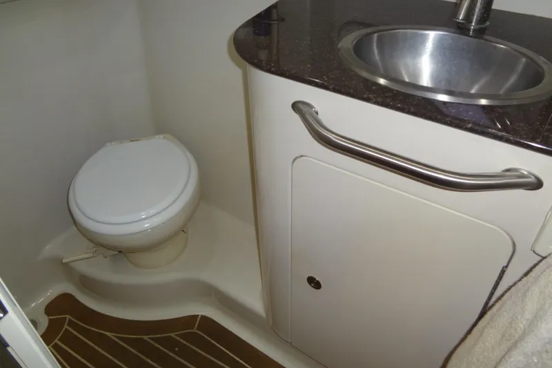 Slide: The Image of Bathroom interior of 2013 Sea Ray Sundancer 330 yacht with toilet and sink. - 53