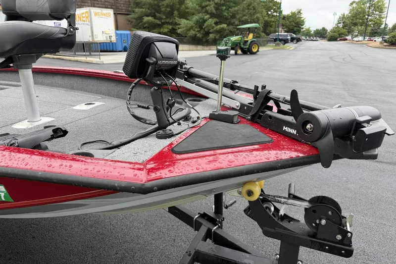 Slide: The Image of 2024 Tracker Pro Team 175 TF boat with Minn Kota trolling motor and Humminbird fish finder. - 8