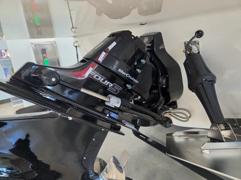 Slide: The Image of Close-up of a MerCruiser engine on a Sea Ray SDX 270 Surf boat. - 36
