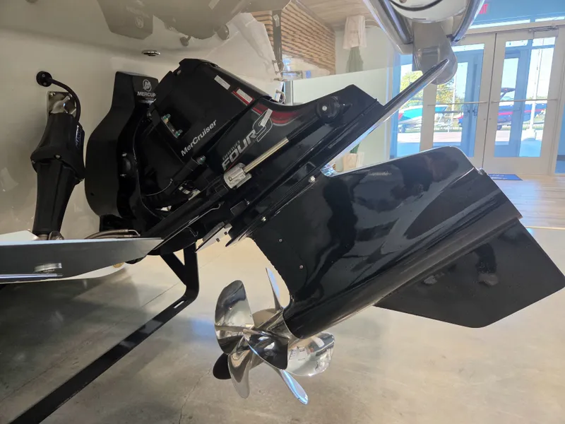 Slide: The Image of Close-up of a Sea Ray SDX 270 Surf drive with a shiny propeller. - 35