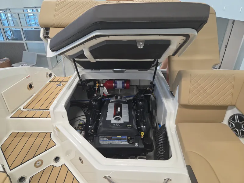 Slide: The Image of The engine compartment of a 2027 Sea Ray SDX 270 Surf with a modern engine. - 11