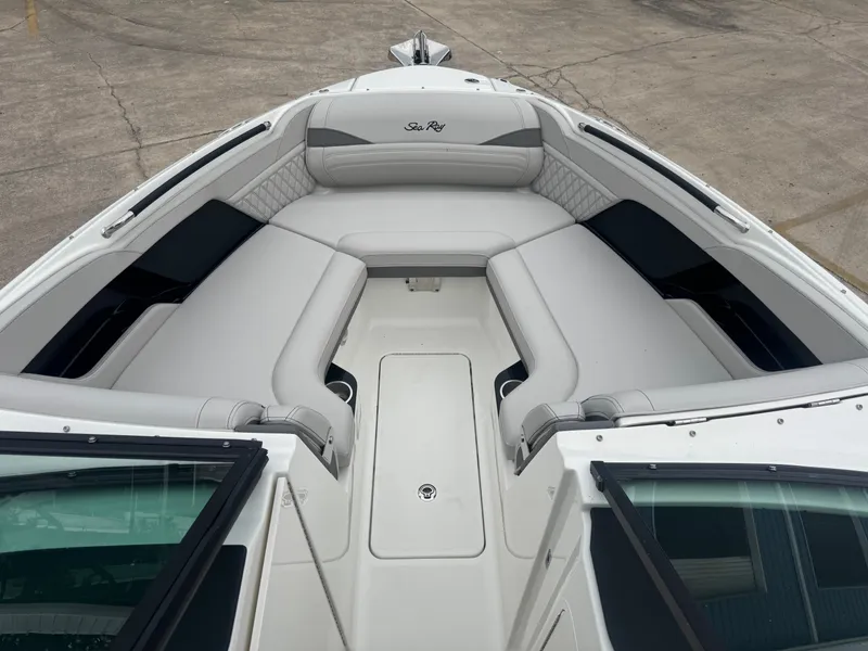 Slide: The Image of The image shows the bow of a 2027 Sea Ray SLX 280 Outboard with gray upholstery. - 15