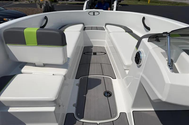 Slide: The Image of 2024 Tahoe T16 boat interior with sleek seating and modern design. - 4