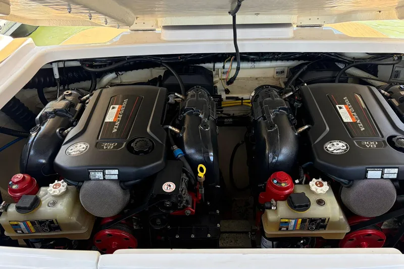 Slide: The Image of Engine compartment of a 2016 Four Winns H290 boat with Volvo Penta engines. - 15