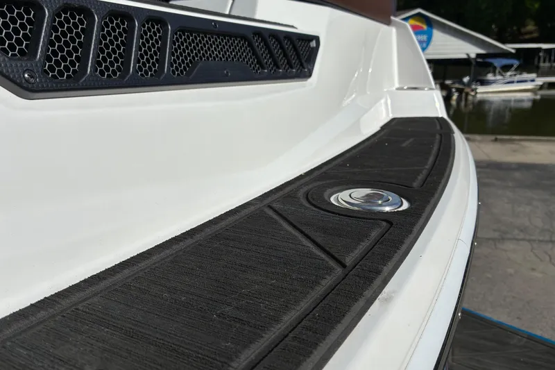 Slide: The Image of 2025 Moomba Max boat deck with textured surface and sleek design. - 8