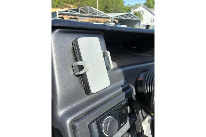 Slide: The Image of Dashboard of 2025 Moomba Max with mounted phone holder. - 34