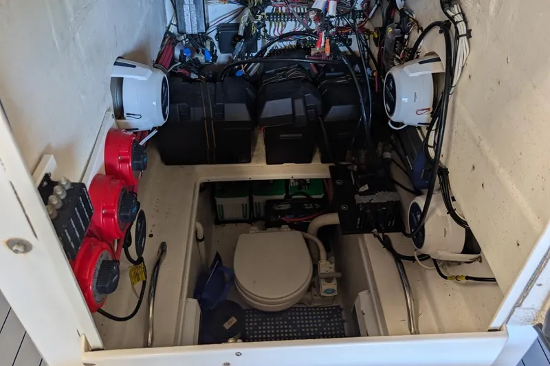 Slide: The Image of Electrical and mechanical components inside a 2005 Contender 31 Open boat. - 18
