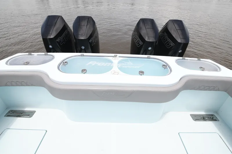 Slide: The Image of 2024 Front Runner 37 Catamaran with quad engines and spacious deck design. - 17
