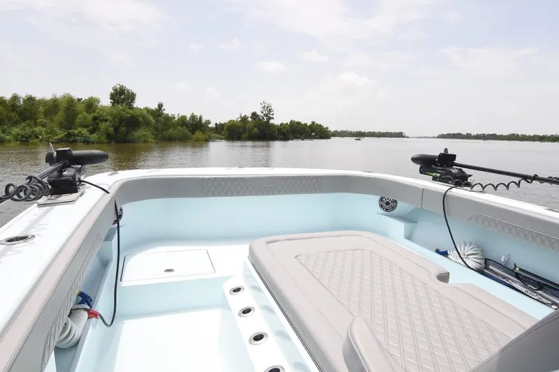 Slide: The Image of 2024 Front Runner 37 Catamaran interior with serene water view. - 14