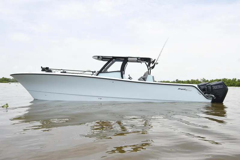 The Image of 2024 Front Runner 37 Catamaran on calm water, showcasing sleek design and powerful engines. - 0