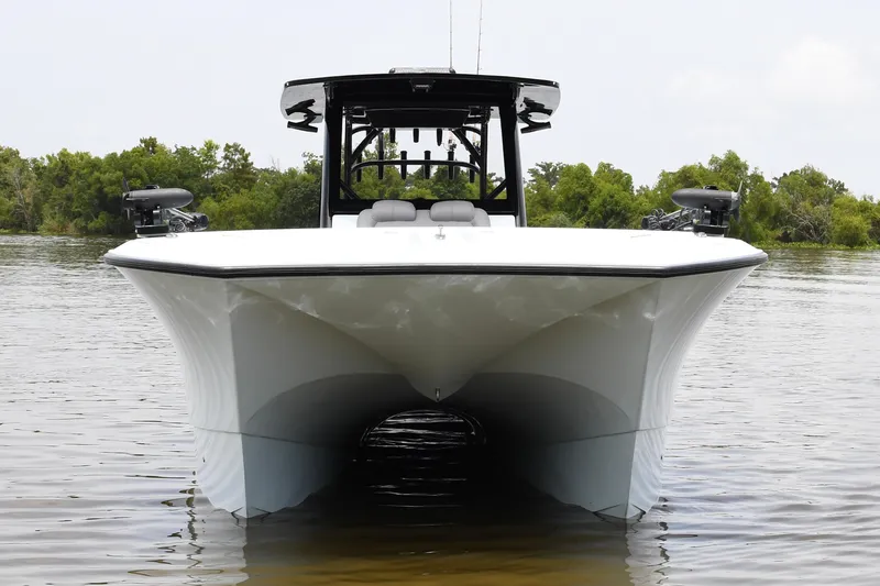 Slide: The Image of 2024 Front Runner 37 Catamaran on calm water, showcasing sleek design and modern features. - 7