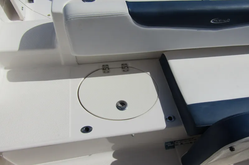 Slide: The Image of 2018 Robalo R202 Explorer boat seating and storage compartment. - 32