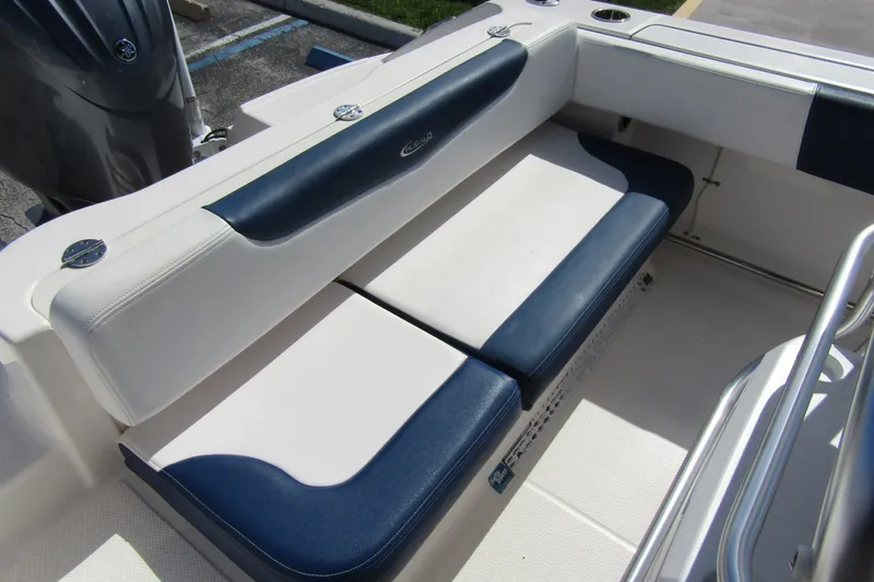 Slide: The Image of 2018 Robalo R202 Explorer boat seating with blue and white upholstery. - 31