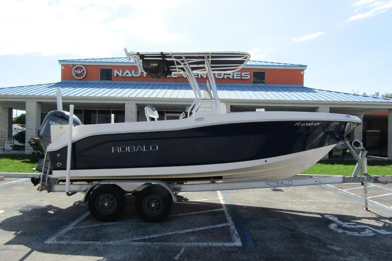 Slide: The Image of 2018 Robalo R202 Explorer boat on trailer outside Nautical Ventures dealership. - 3