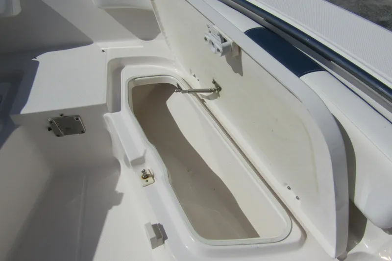 Slide: The Image of Open storage compartment on 2018 Robalo R202 Explorer boat. - 14