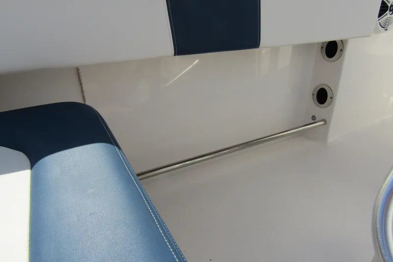 Slide: The Image of Interior seating of 2018 Robalo R202 Explorer boat with blue and white upholstery. - 35