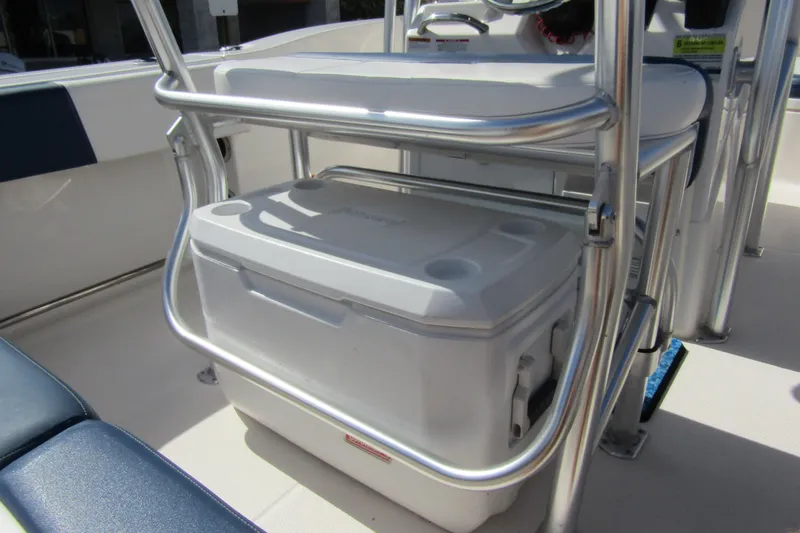 Slide: The Image of 2018 Robalo R202 Explorer boat interior with cooler storage under seating. - 30