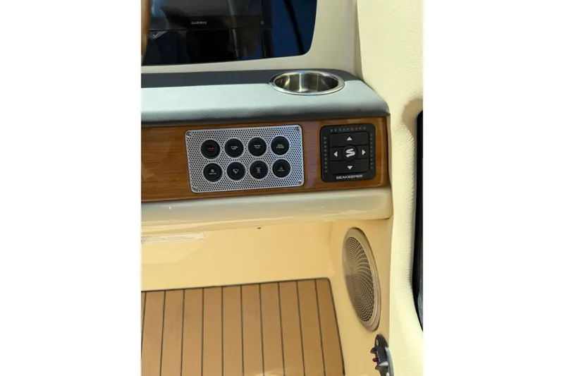 Slide: The Image of Control panel of 2027 Chris-Craft Calypso 28 boat with Seakeeper system. - 17