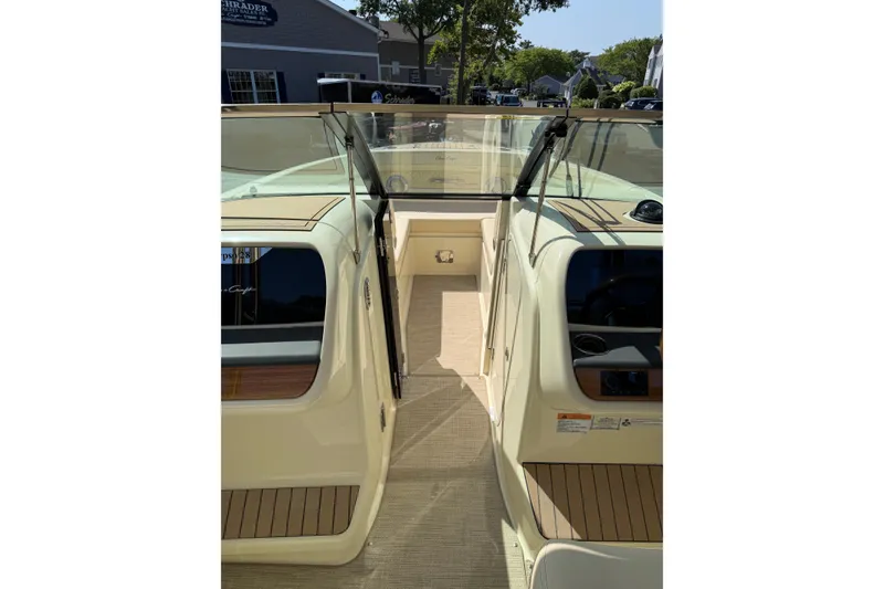 Slide: The Image of 2027 Chris-Craft Calypso 28 boat interior with open cockpit and elegant design. - 18