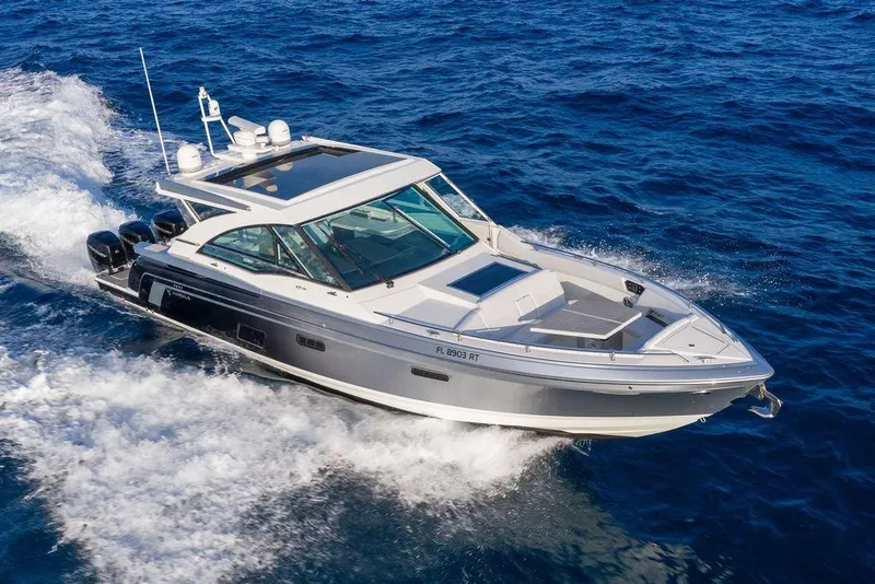Slide: The Image of The 2018 Formula 430 Super Sport Crossover speeds across the blue sea, featuring sleek design and luxurious details. - 12