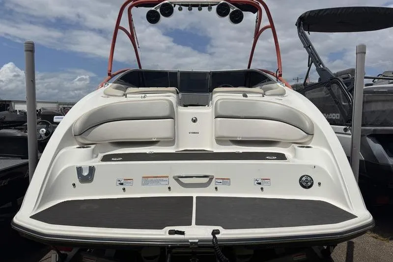 Slide: The Image of 2011 Yamaha Boats AR240 HO rear view with swim platform and seating. - 10