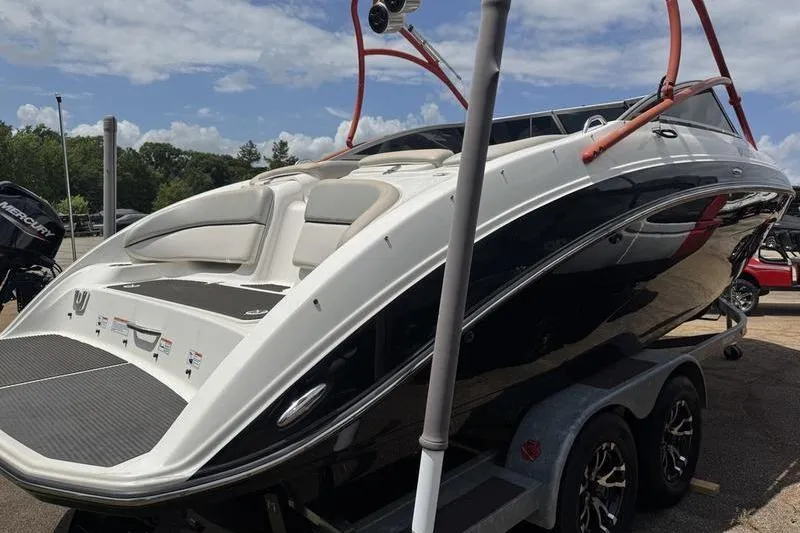 Slide: The Image of 2011 Yamaha Boats AR240 HO on trailer, sleek design under a blue sky. - 11