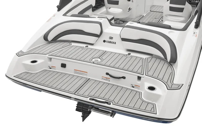 Slide: The Image of The image shows the stern of a 2024 Yamaha 195S boat with gray cushions and teak-style decking. - 40