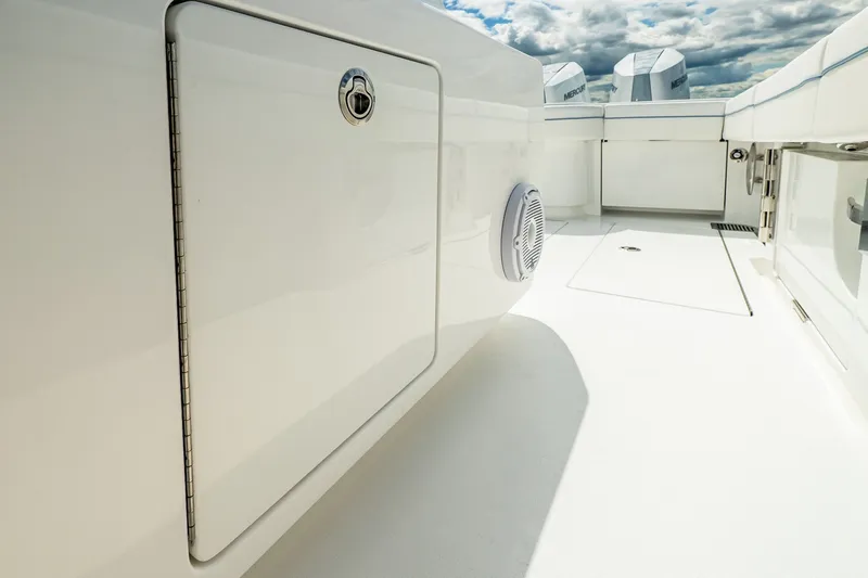 Slide: The Image of Sleek deck of 2027 Valhalla V-37 boat under a cloudy sky. - 27