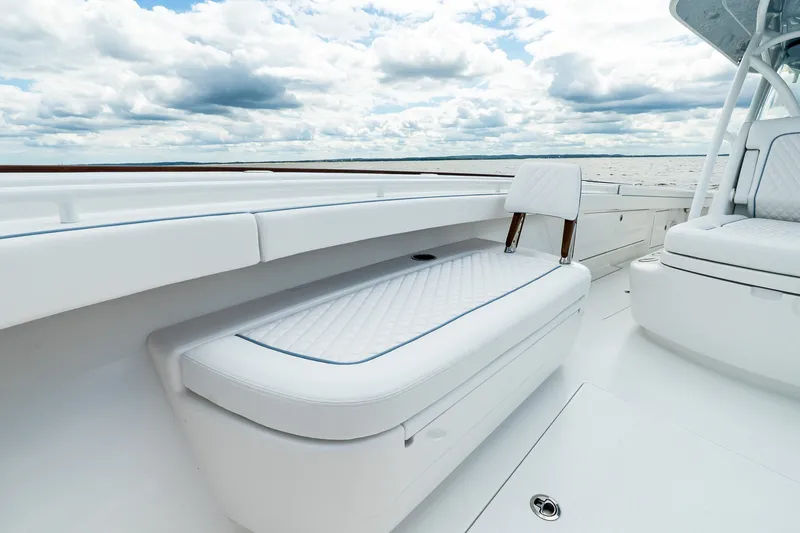 Slide: The Image of Luxurious 2027 Valhalla V-37 boat interior with white seating and ocean view. - 59