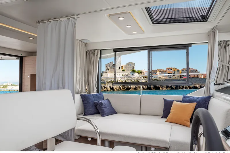 Slide: The Image of Luxurious interior of 2026 Beneteau Swift Trawler 41 Fly with scenic ocean view. - 9