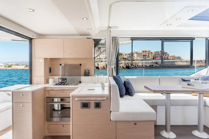 Slide: The Image of Luxurious interior of 2026 Beneteau Swift Trawler 41 Fly with scenic ocean view. - 2