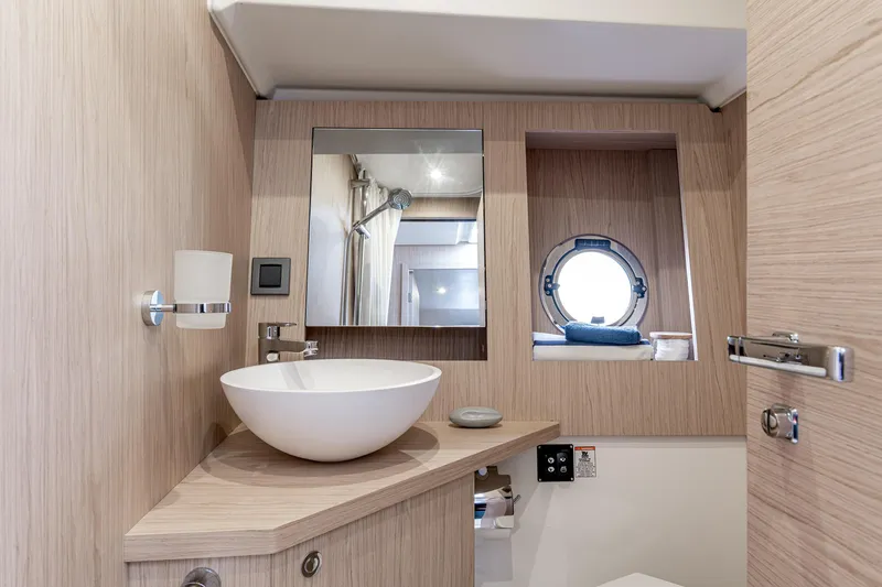 Slide: The Image of Modern bathroom interior on 2026 Beneteau Swift Trawler 41 Fly yacht. - 14