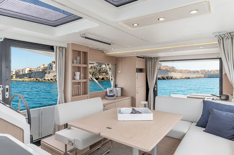 Slide: The Image of Luxurious interior of 2026 Beneteau Swift Trawler 41 Fly with scenic ocean view. - 17