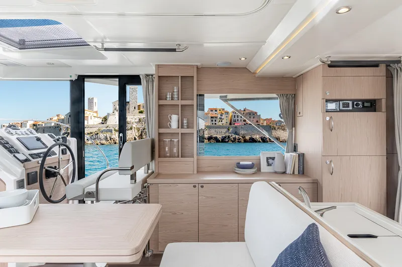 Slide: The Image of Interior of 2026 Beneteau Swift Trawler 41 Fly, featuring modern design and scenic ocean view. - 6