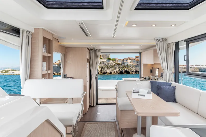 Slide: The Image of Interior of 2026 Beneteau Swift Trawler 41 Fly, featuring modern design and ocean view. - 15