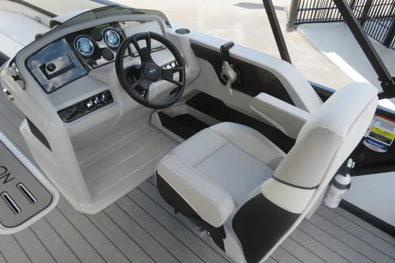 Slide: The Image of 2027 Avalon LSZ Versatile Rear Bench boat cockpit with steering wheel and control panel. - 35