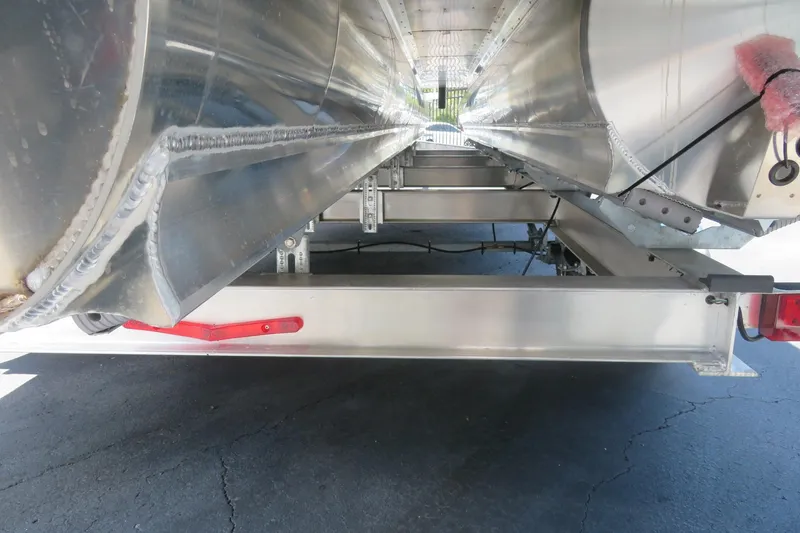 Slide: The Image of Underneath view of 2027 Avalon LSZ Versatile Rear Bench pontoon boat, showcasing aluminum structure. - 10