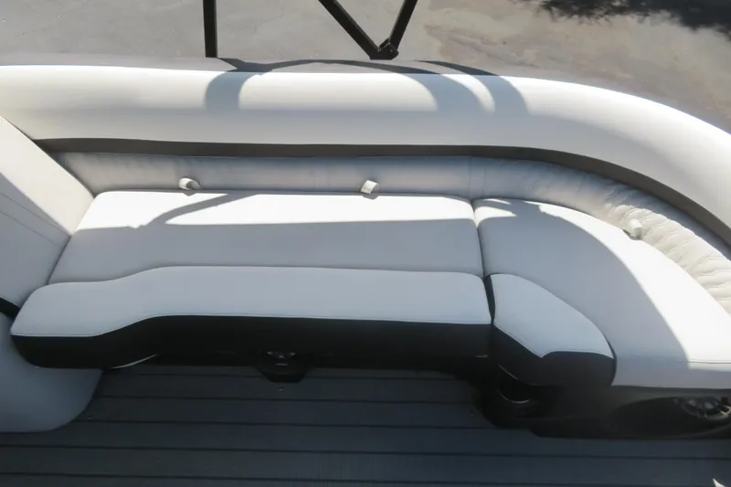 Slide: The Image of 2027 Avalon LSZ Versatile Rear Bench, 25-foot boat seating, elegant white and black design. - 23