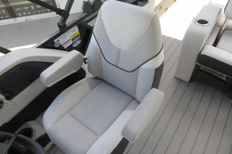 Slide: The Image of Captain's chair on 2027 Avalon LSZ Versatile Rear Bench boat, featuring sleek design and comfort. - 36