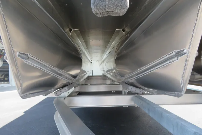 Slide: The Image of Close-up of 2027 Avalon LSZ Versatile Rear Bench pontoon undercarriage, showcasing sleek aluminum construction. - 14