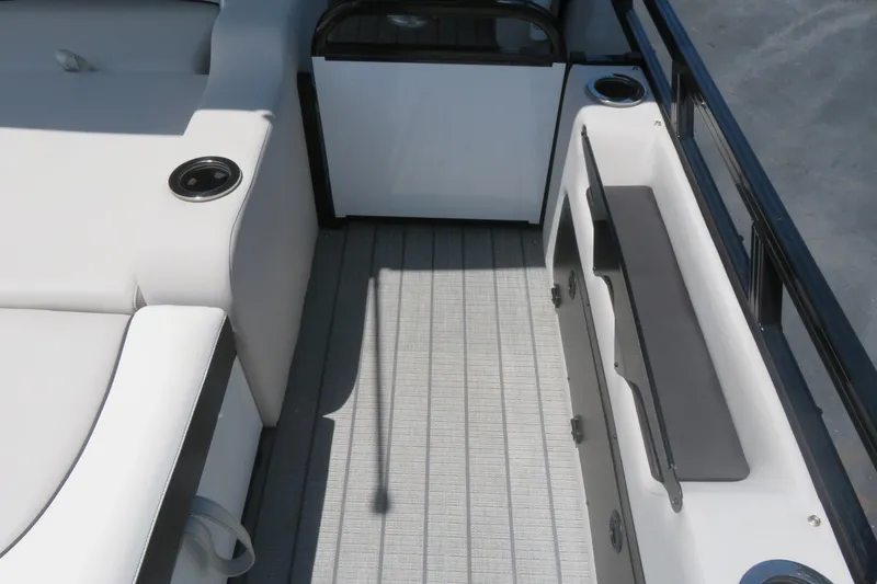 Slide: The Image of 2027 Avalon LSZ Versatile Rear Bench boat interior with sleek seating and cup holders. - 18