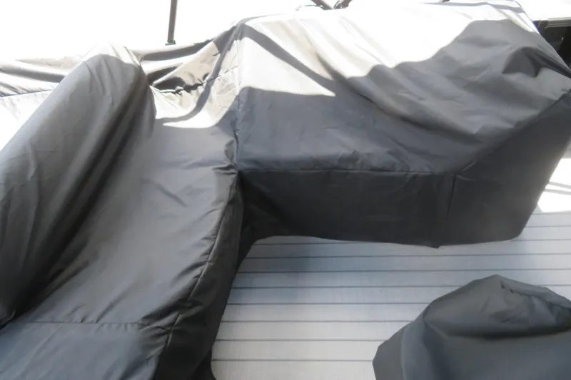 Slide: The Image of Covered seating area on 2027 Avalon LSZ Versatile Rear Bench boat. - 44
