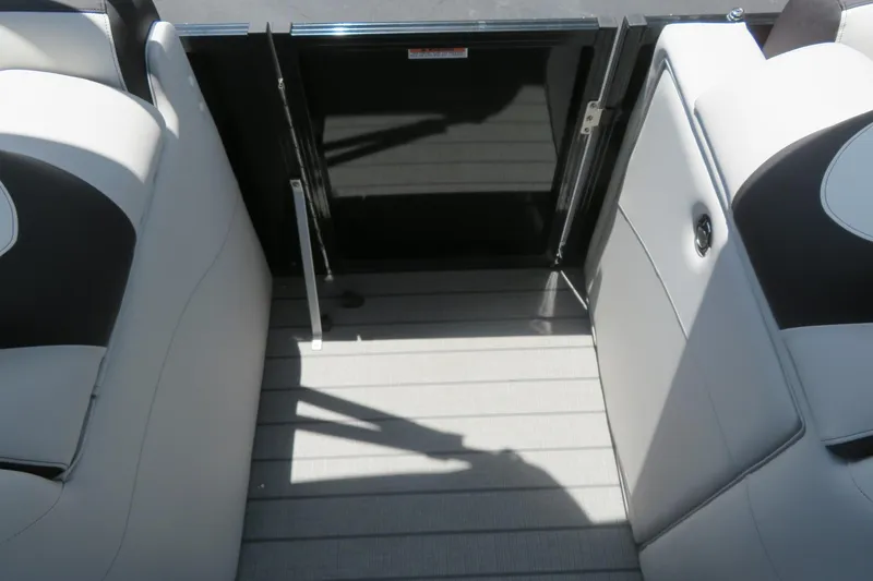 Slide: The Image of Interior view of 2027 Avalon LSZ Versatile Rear Bench boat, featuring sleek seating design. - 29