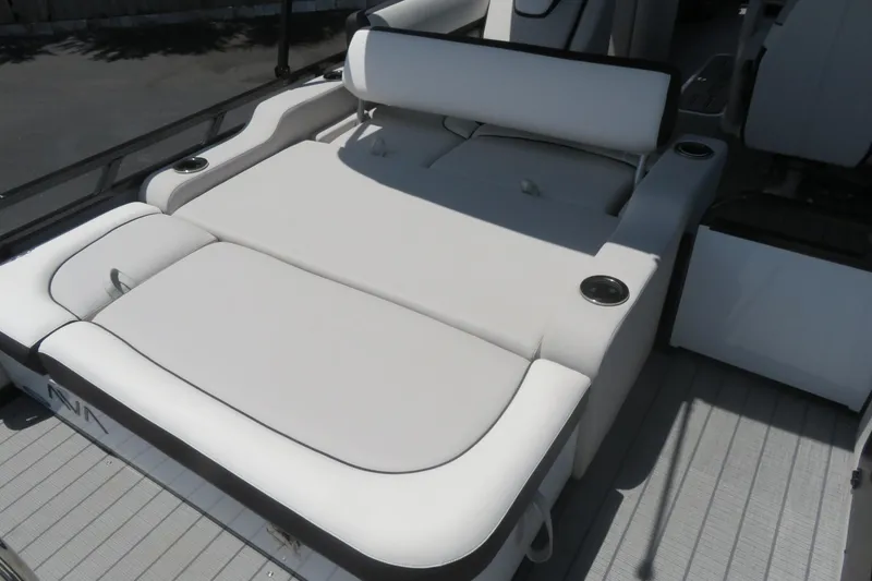 Slide: The Image of 2027 Avalon LSZ Versatile Rear Bench, 25-foot boat, featuring luxurious seating and cup holders. - 15