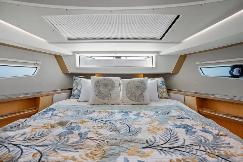 Slide: The Image of Luxurious bedroom interior of 2023 Sealine C335V yacht with elegant bedding and modern design. - 20