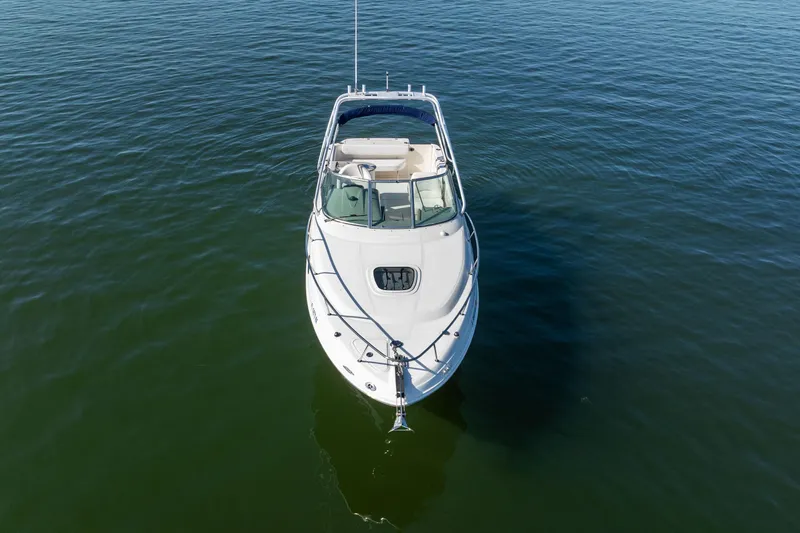 Slide: The Image of 2005 Sea Ray 270 Amberjack boat on calm water, aerial view. - 4