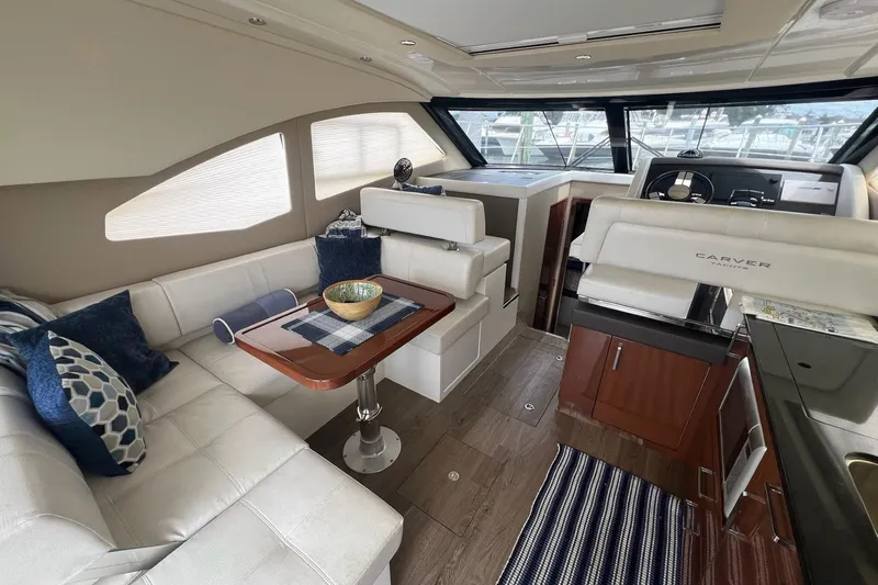 Slide: The Image of Luxurious interior of 2019 Carver C37 yacht with elegant seating and modern helm. - 26