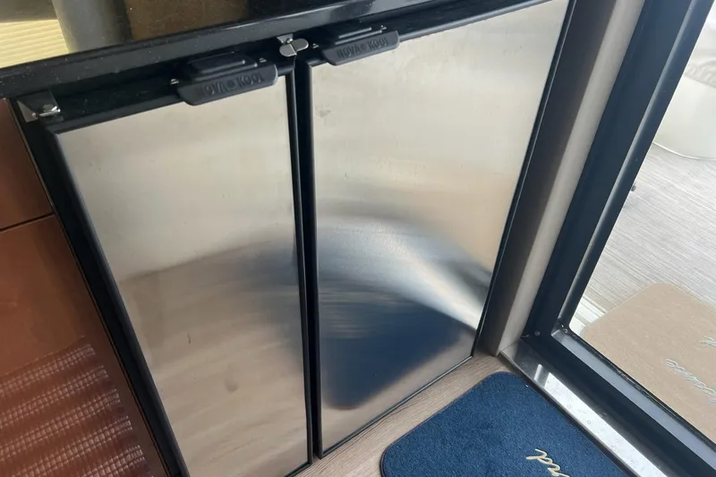 Slide: The Image of Stainless steel refrigerator in 2019 Carver C37 yacht interior. - 32