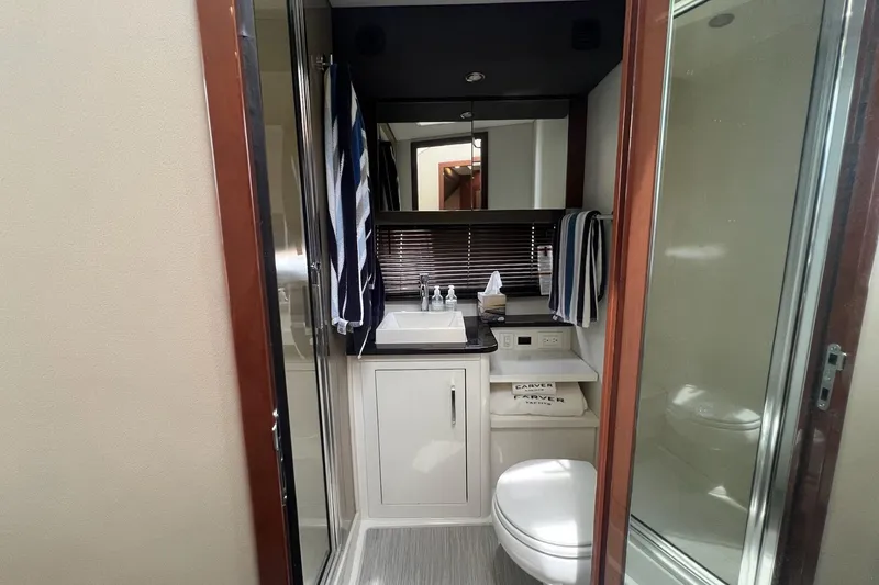 Slide: The Image of Bathroom interior of 2019 Carver C37 yacht with modern fixtures and shower. - 36