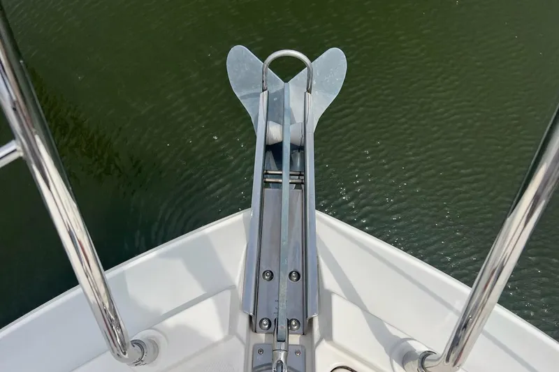 Slide: The Image of Bow view of 2019 Carver C37 yacht with anchor over water. - 13